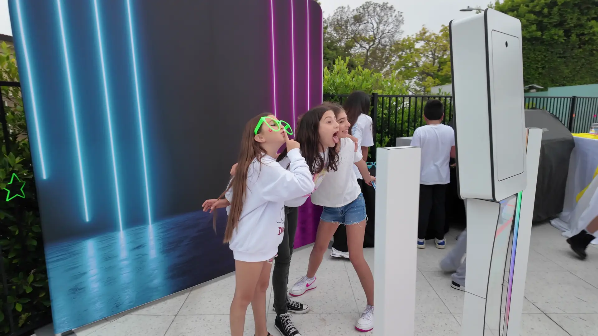 Photo booth rental in Los Angeles with backdrop and additional lighting